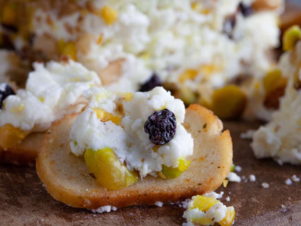 goat cheese log with pistachios and blackcurrants 