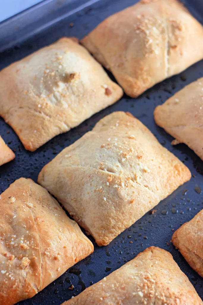 Golden brown chicken crescent pockets fresh from the oven.