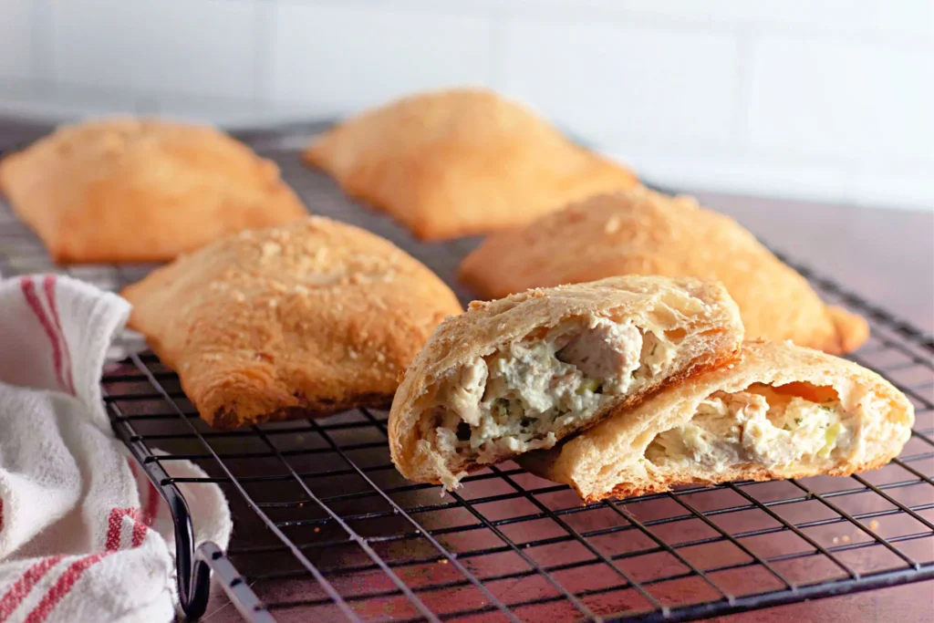 Chicken crescent pocket cut open, showing creamy chicken filling inside.