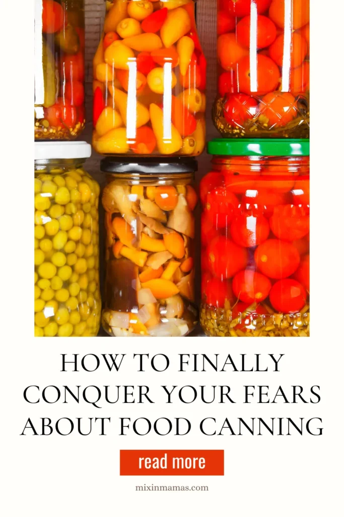 Glass jars filled with colorful vegetables preserved through food canning.