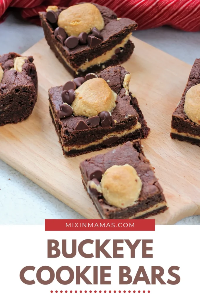 Buckeye Cookie Bars on a wooden serving board highlighting the creamy peanut butter center and fudgy chocolate cookie layers.