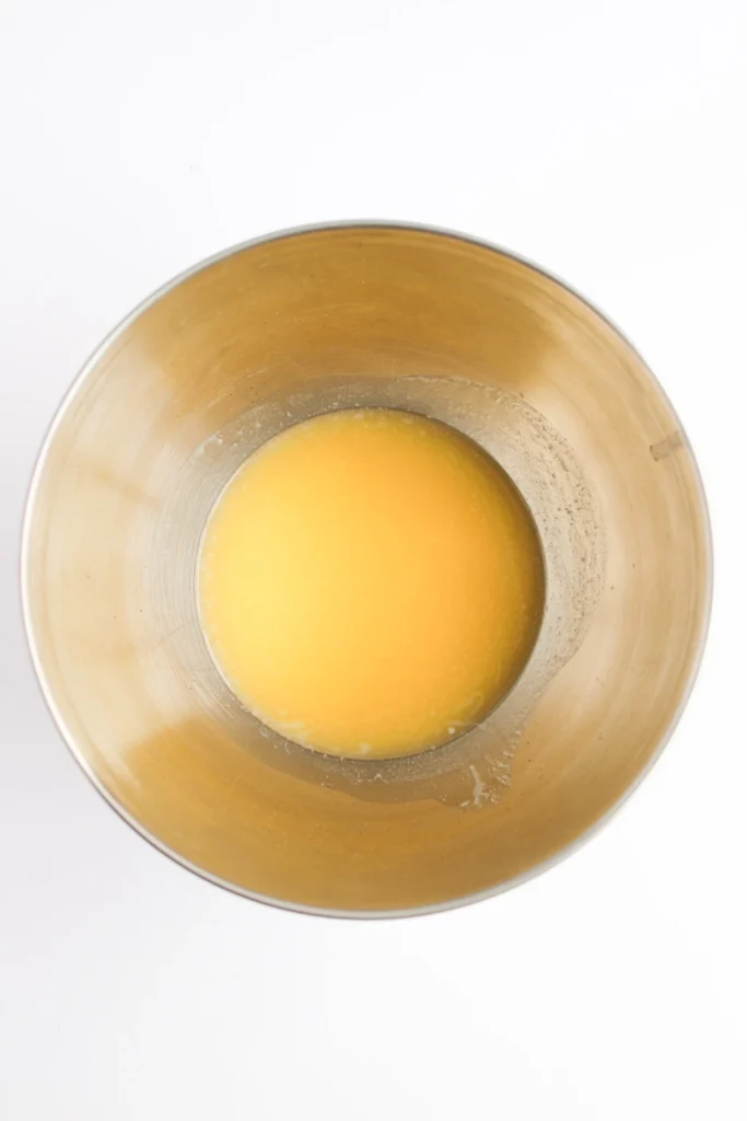 butter in a mixing bowl for making buttercream frosting