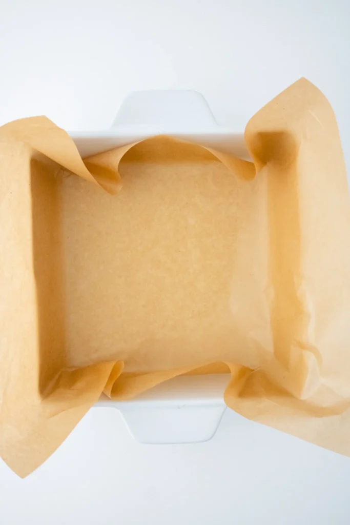 Parchment-lined pan prepared for homemade marshmallows