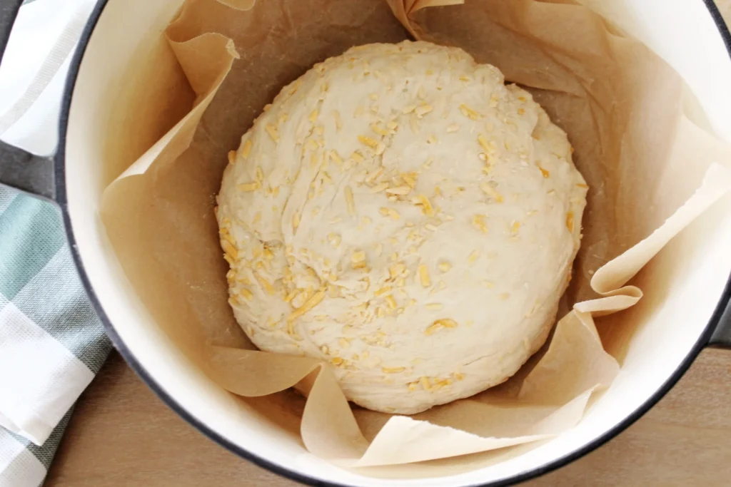 Cheddar cheese folded into artisan bread dough