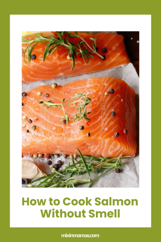 Raw salmon fillet with herbs and peppercorns showing how to cook salmon without smell