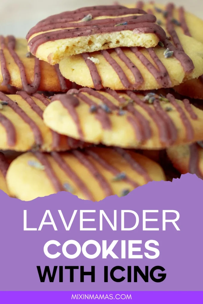 Close-up of lavender cookies drizzled with purple icing and topped with dried lavender