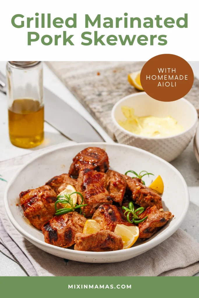 Grilled marinated pork skewers served with homemade aioli and lemon.